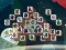 Játék Among Mahjong Tiles online